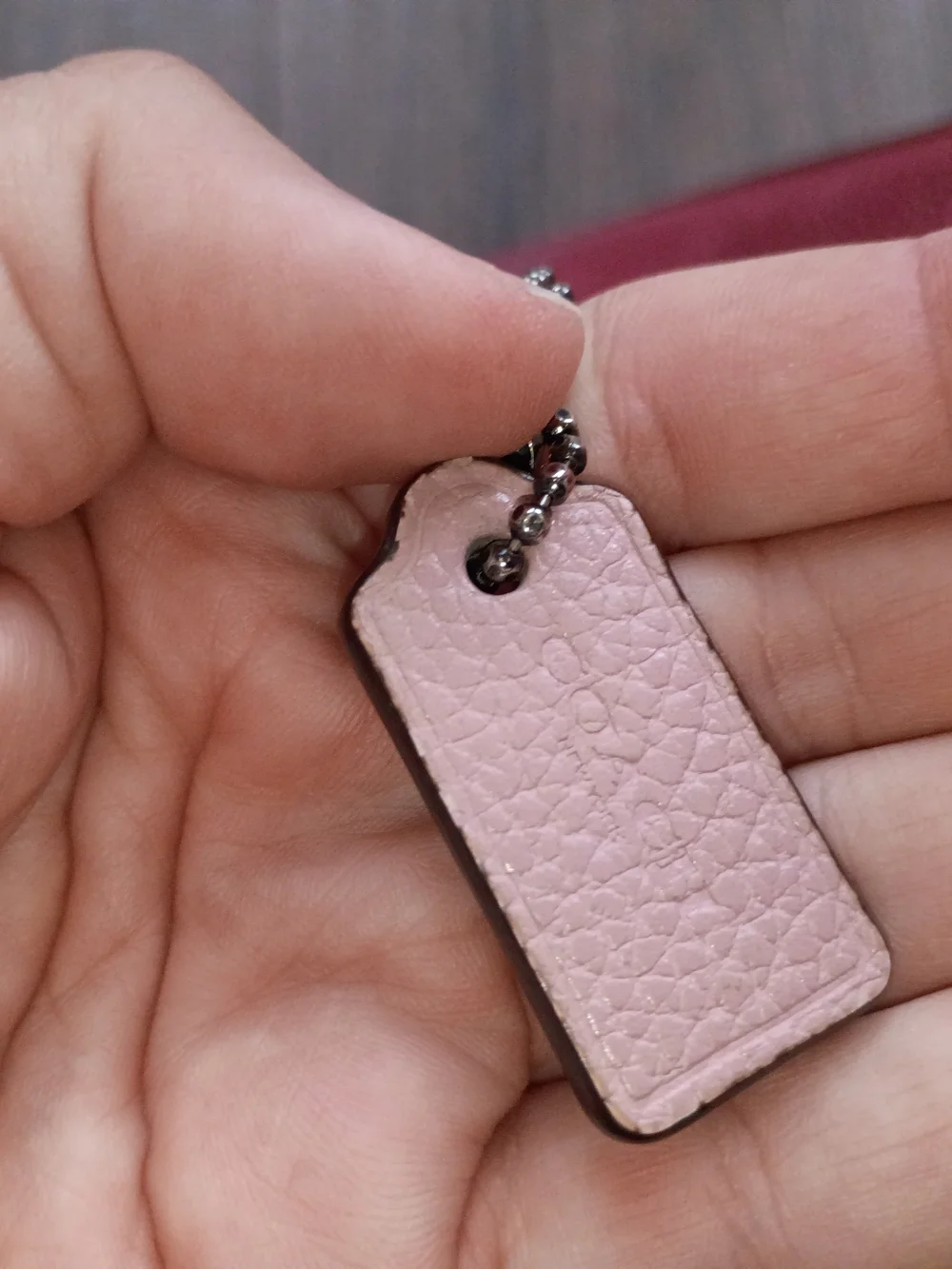 Coach Two-Toned Pink Pebbled Leather Crossbody Wallet